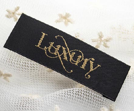 缎面织边黑底黄字织唛标