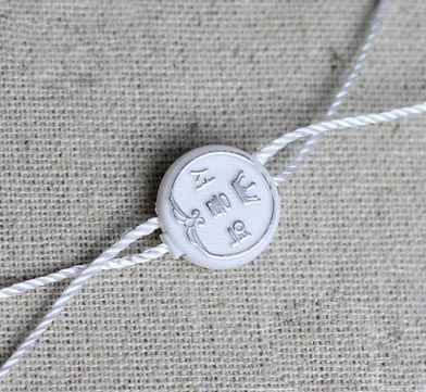 圆形吊粒烫银字